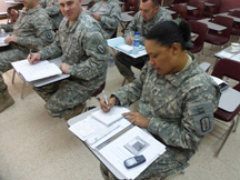 Taking lots of notes was the order of the day duing class in Kuwait